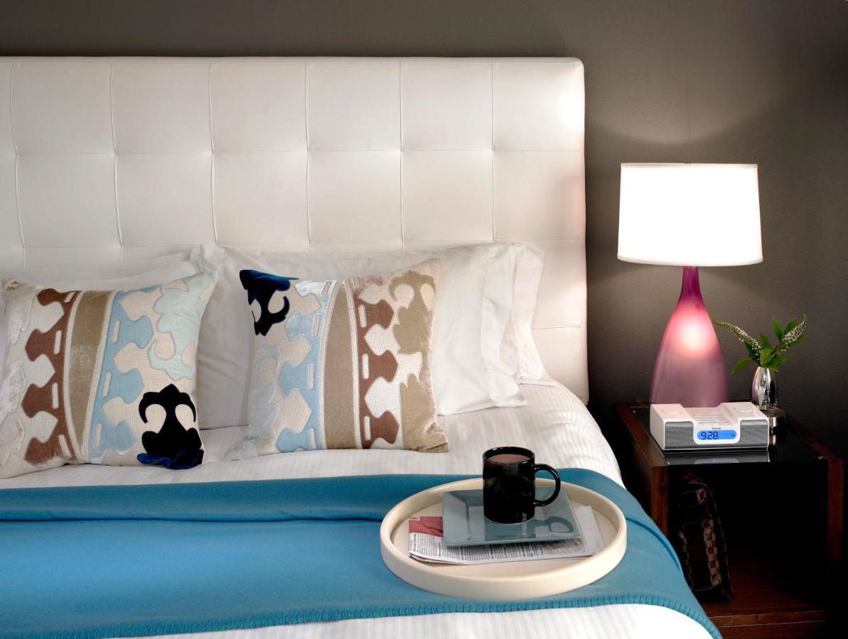 Hotel Murano Tacoma Bilik gambar A bedroom at the Hotel Indigo in San Francisco